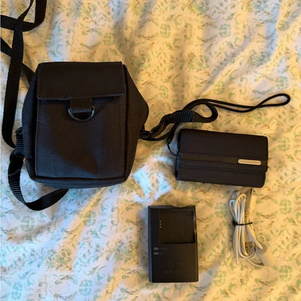 Canon Red Digital Camera with Black Accessories
